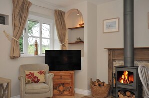 Ferienhaus | Wohnbereich | Fernseher