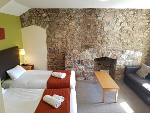 Family Triple Room, 1 Bedroom | Select Comfort beds, desk, laptop workspace, iron/ironing board