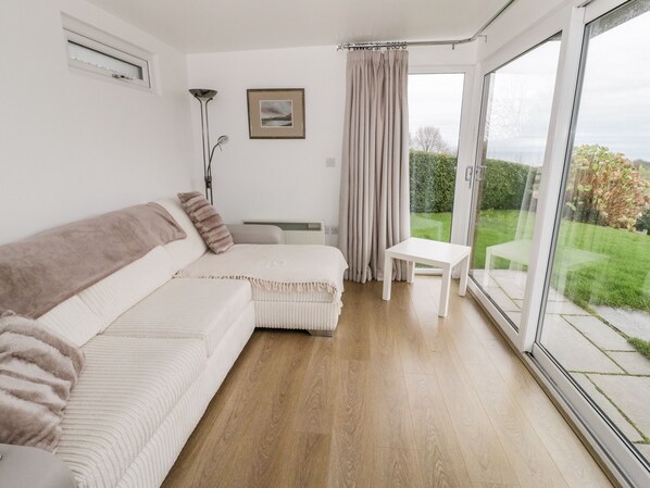 Cottage | Living area | TV, DVD player - Bron Heulog Cottage (Beaumaris)