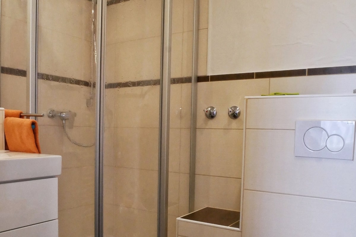 junior suite | bathroom | deep-soaking bathtub, free toiletries, hair dryer, towels