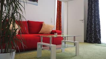 Junior-Suite | Wohnbereich | Fernseher