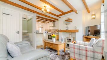 Cottage | Ruang keluarga | TV dan pemutar DVD