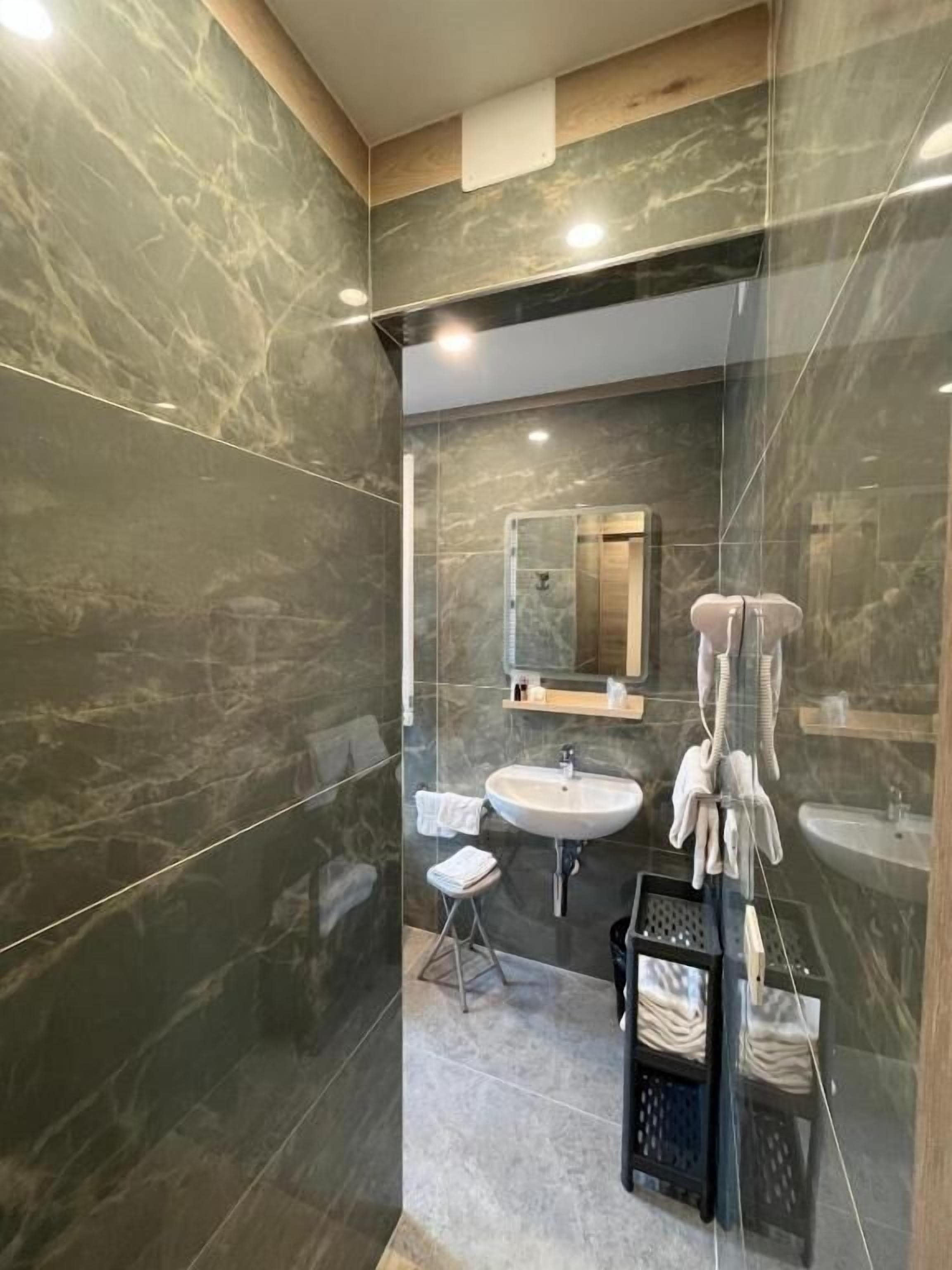 Suite Deluxe, vista mare (Afrodite) | Bagno | Pantofole