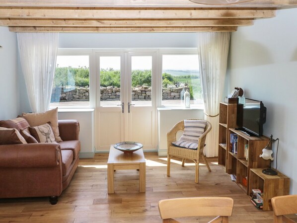 Ferienhaus | Wohnbereich | Fernseher