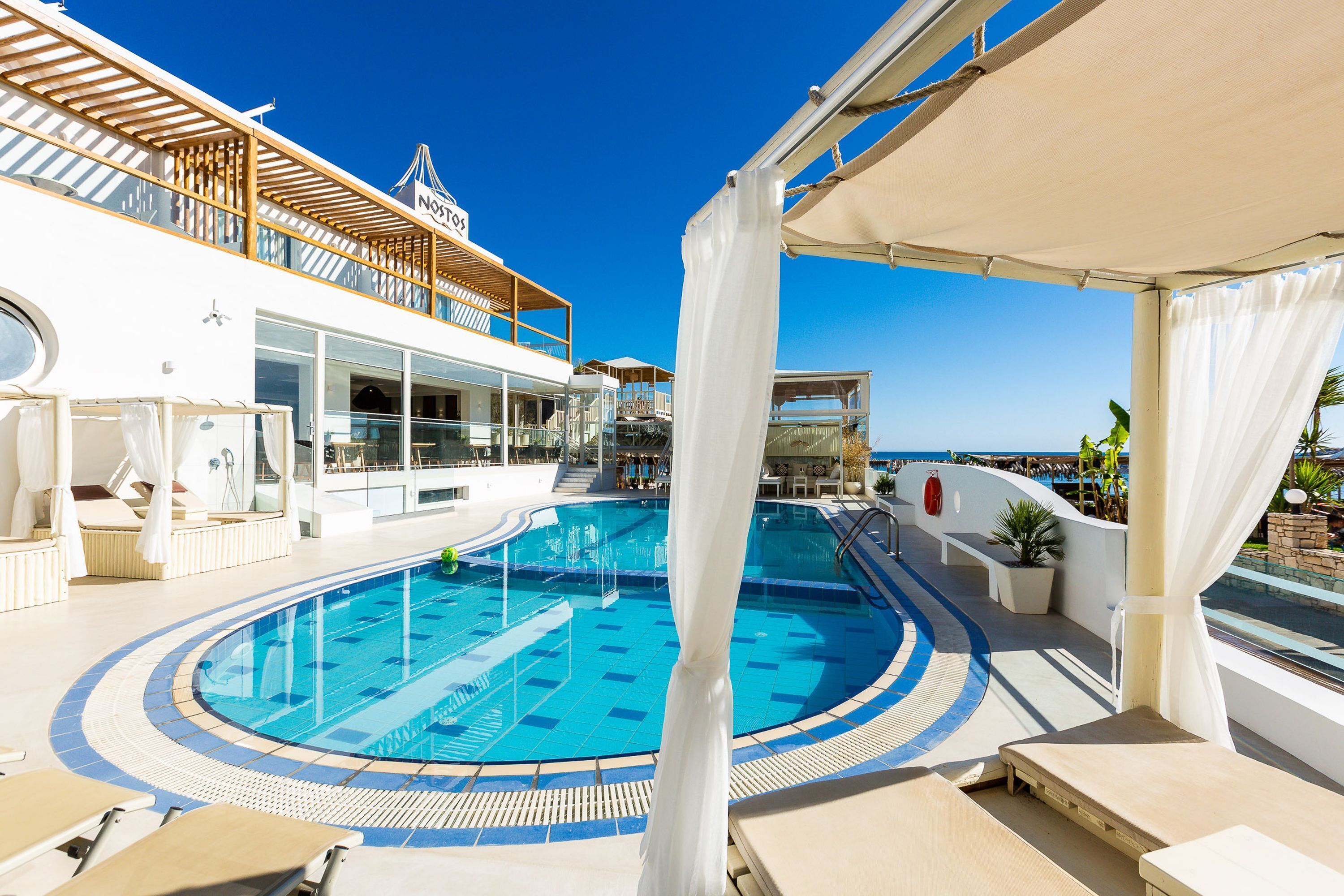 2 outdoor pools, pool umbrellas, pool loungers