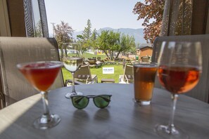 Outdoor pool, open 7:00 AM to 10:00 PM, pool loungers - Fairmont Hot Springs Resort (Fairmont Hot Springs)