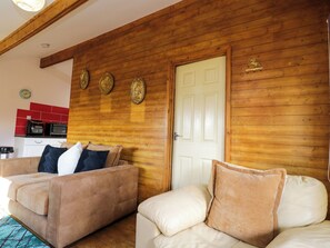 Ferienhaus | Wohnbereich | Fernseher