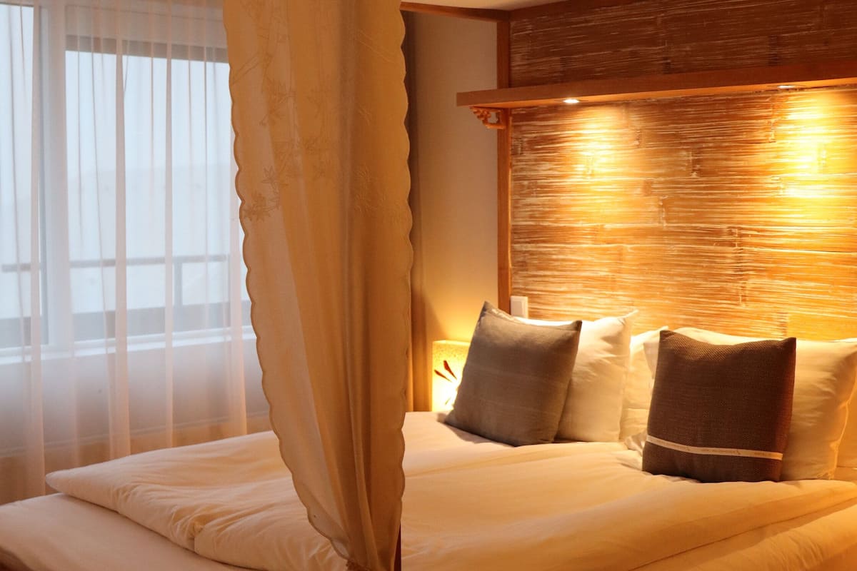 deluxe double room | down duvets, in-room safe, desk, blackout curtains