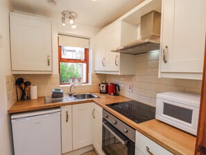 Cottage | Private kitchen | Fridge, microwave, stovetop, electric kettle - Waterside Cottage (Whitby)