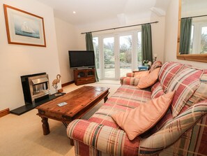 Ferienhaus | Wohnzimmer | Fernseher