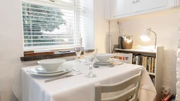 Cottage | Private kitchen | Fridge, microwave, stovetop, highchair