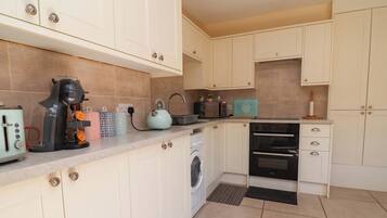 Cottage | Private kitchen | Highchair, cookware/dishes/utensils