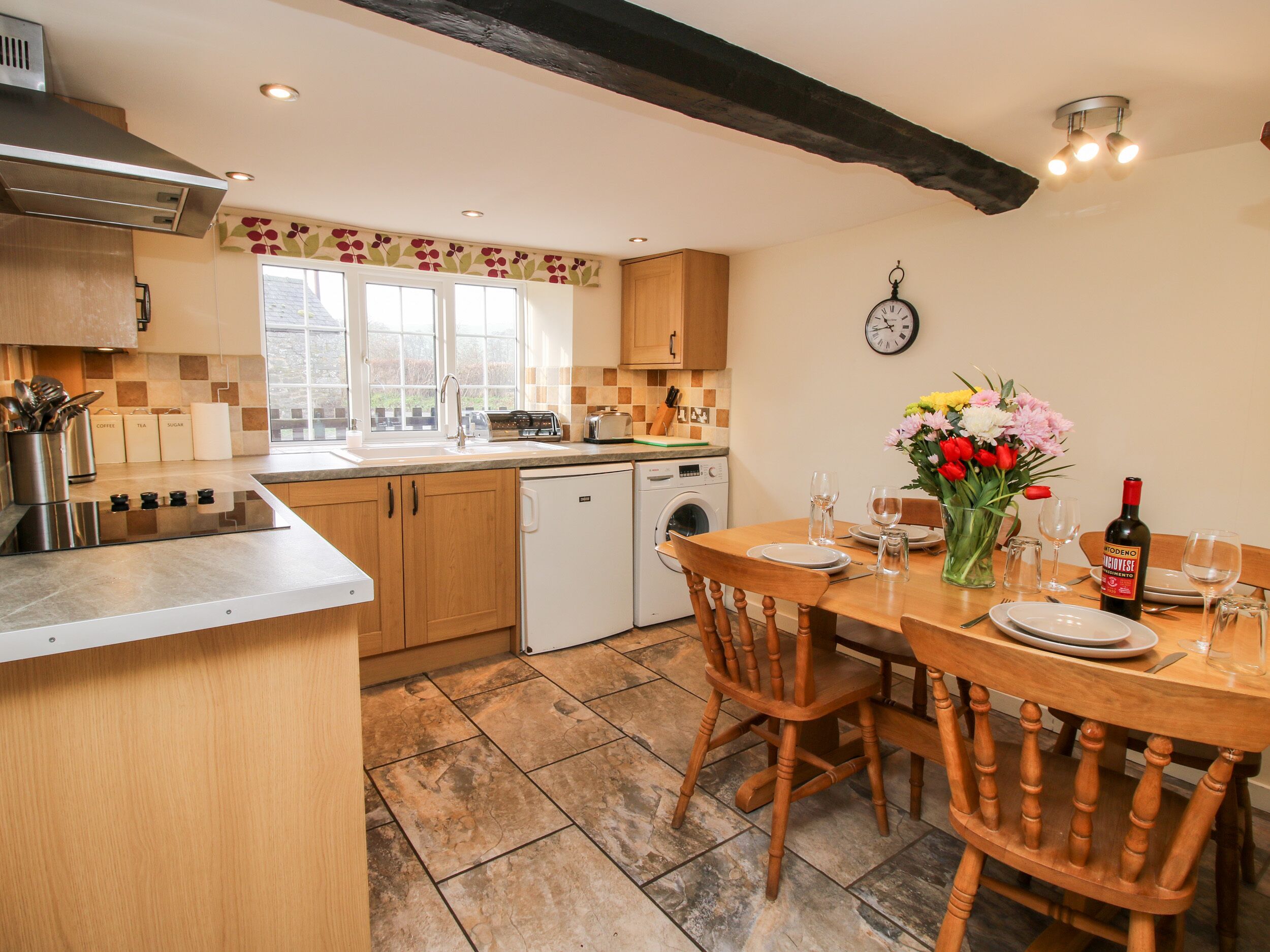 Cottage | Private kitchen | Fridge, microwave, stovetop, high chair