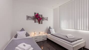 Familienzimmer | Schreibtisch, Bügeleisen/Bügelbrett, kostenloses WLAN, Bettwäsche