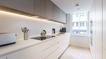 Apartment, 2 Bedrooms | Private kitchen | Full-size fridge, microwave, oven, stovetop