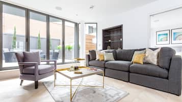 Apartment, 2 Bedrooms | Living area | Flat-screen TV