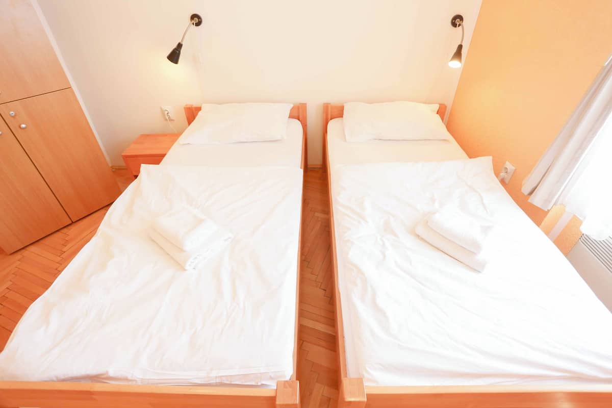 classic double or twin room, shared bathroom, city view | 1 bedroom, soundproofing, iron/ironing board, free wifi