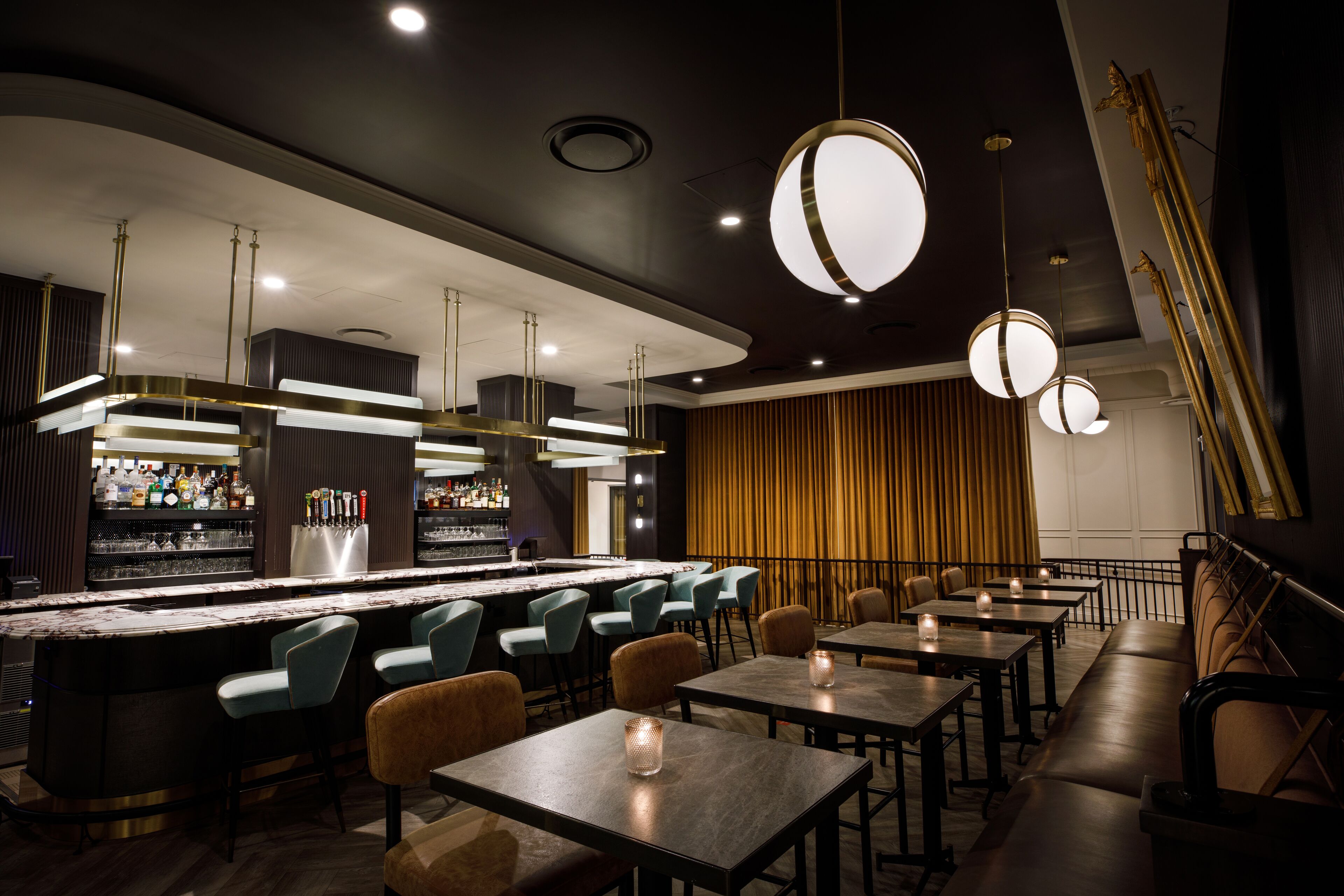 A bar area with seating and a bar counter.