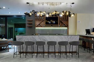 2 bars/lounges, rooftop bar