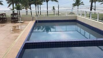 Outdoor pool, open 9:00 AM to 10:00 PM, sun loungers