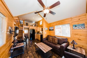 Deluxe Cottage | Living area | 24-inch TV with cable channels