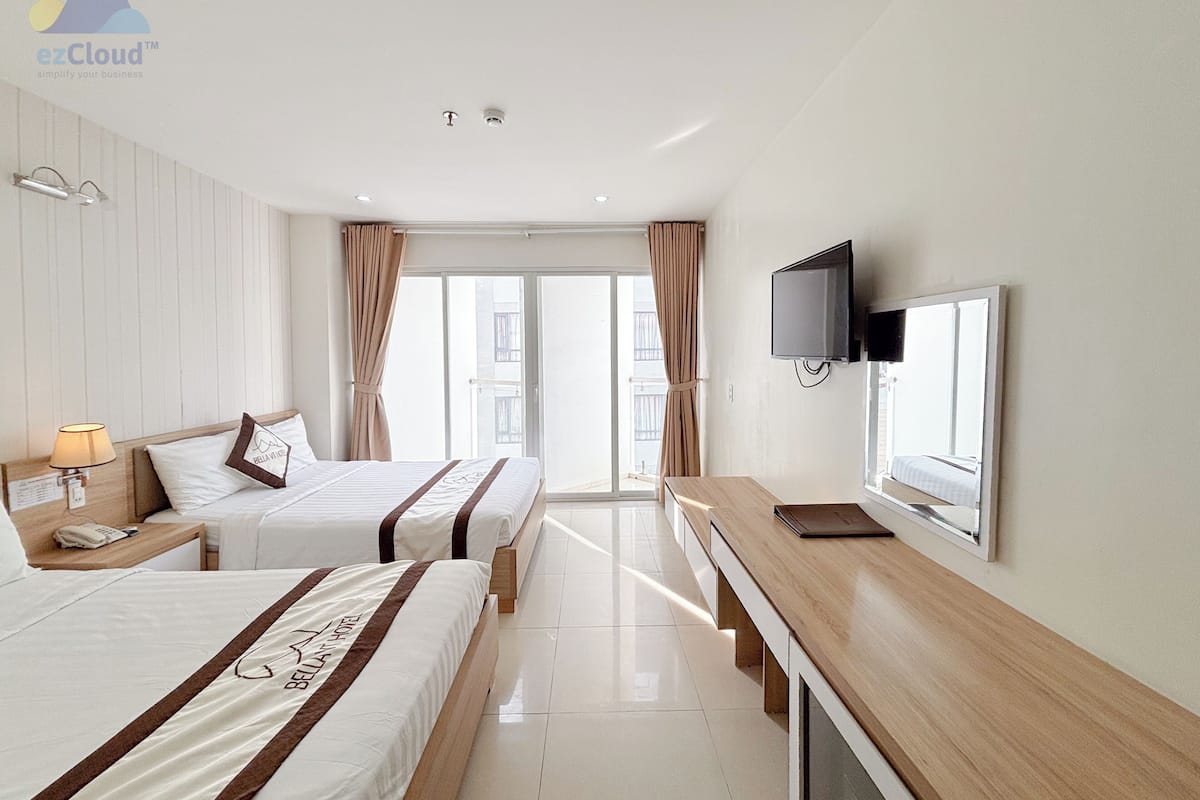 Deluxe Quadruple Room (with View) | 1 bedroom, minibar, laptop workspace, soundproofing