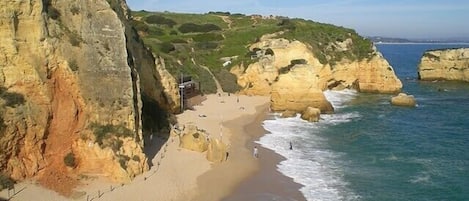 Beach nearby, sun loungers