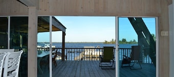 Beautiful Riverfront Chalet w/ Pool & Boat Dock- Old Florida Fun- Pet Friendly!