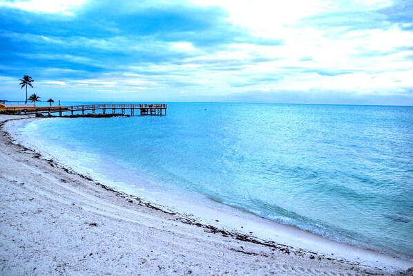 On the beach, sun-loungers, beach towels