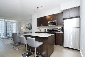 Fridge, microwave, oven, stovetop - Modern Paradise Condo Just over Scotia Bank Arena/ Leafs/Raptors (Old Toronto)