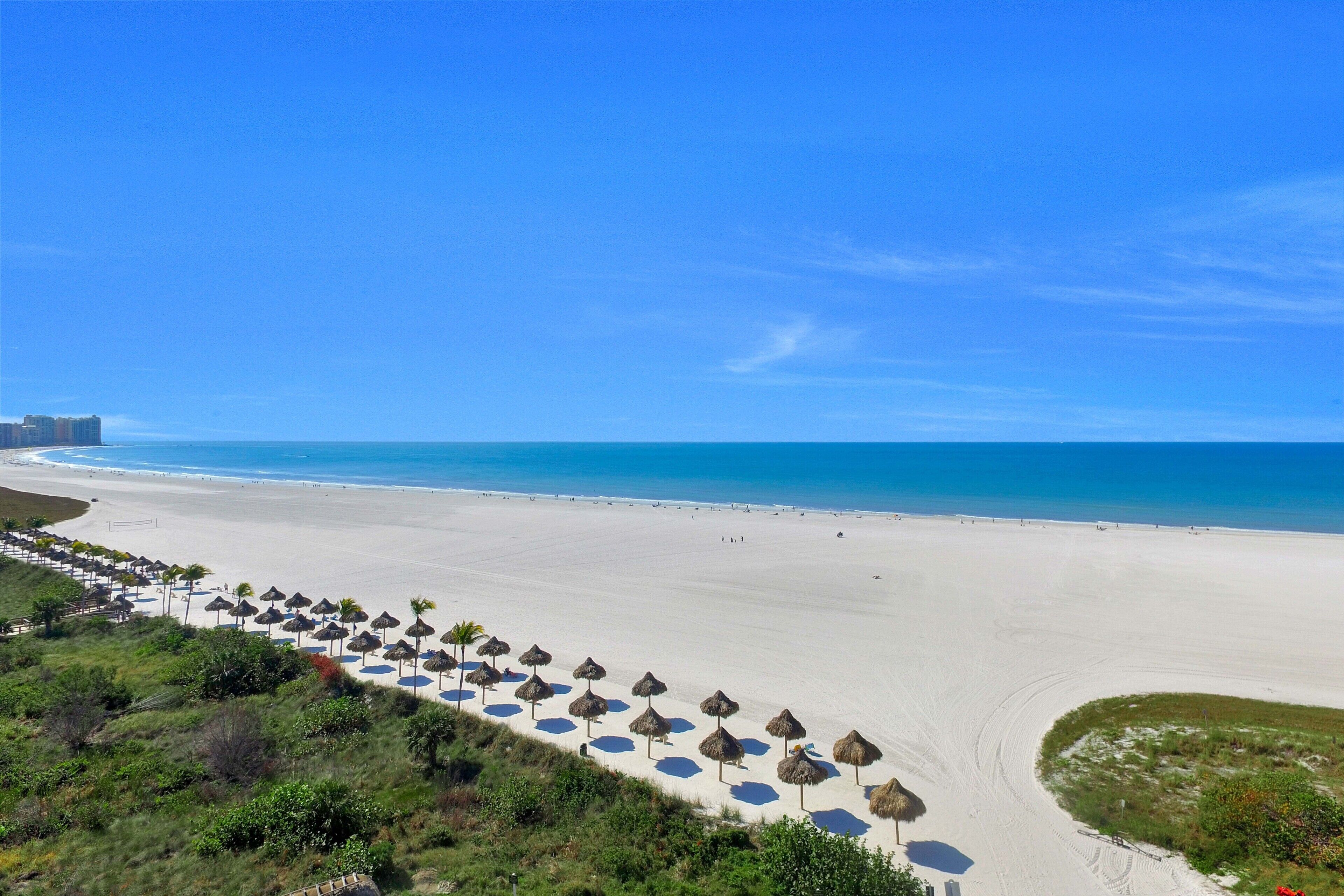 Sunny beachfront condo w/ pool & SW-facing balcony