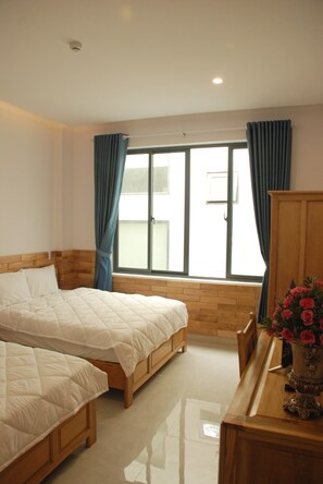 Twin Double Room | Minibar, desk, laptop workspace, soundproofing - Bac Nam Hotel (Da Nang)