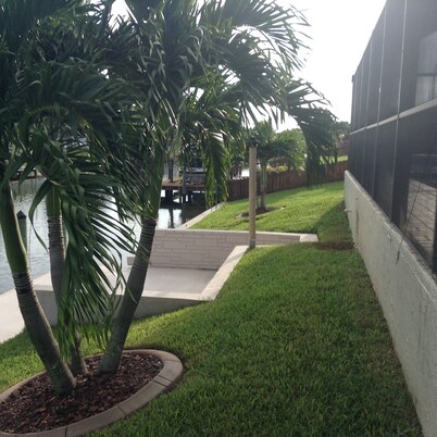 Villa Carina - Gulf Access Canal Home with Solar & Electric Heated Pool