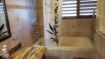 Shower, towels, soap, toilet paper