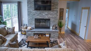 Smart TV, fireplace, foosball