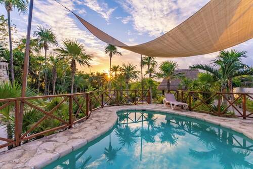 One-of-a-Kind Akumal Villa – Eclectic Design, Pool & Private Lagoon Access