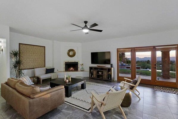 Flat-screen TV, fireplace