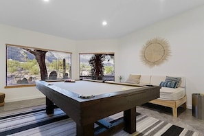 Enjoy the Game Room with stunning mountain views.