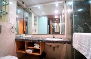 Shower, free toiletries, hair dryer, slippers