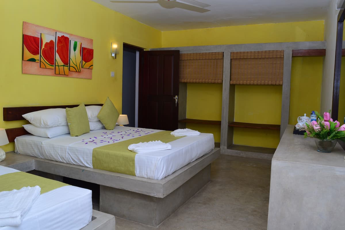 Chambre Triple Deluxe | Fer et planche à repasser, Wi-Fi gratuit, draps fournis