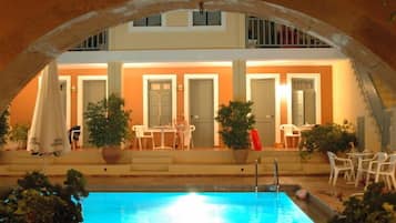 Outdoor pool, open 8:00 AM to 9:00 PM, pool umbrellas, pool loungers