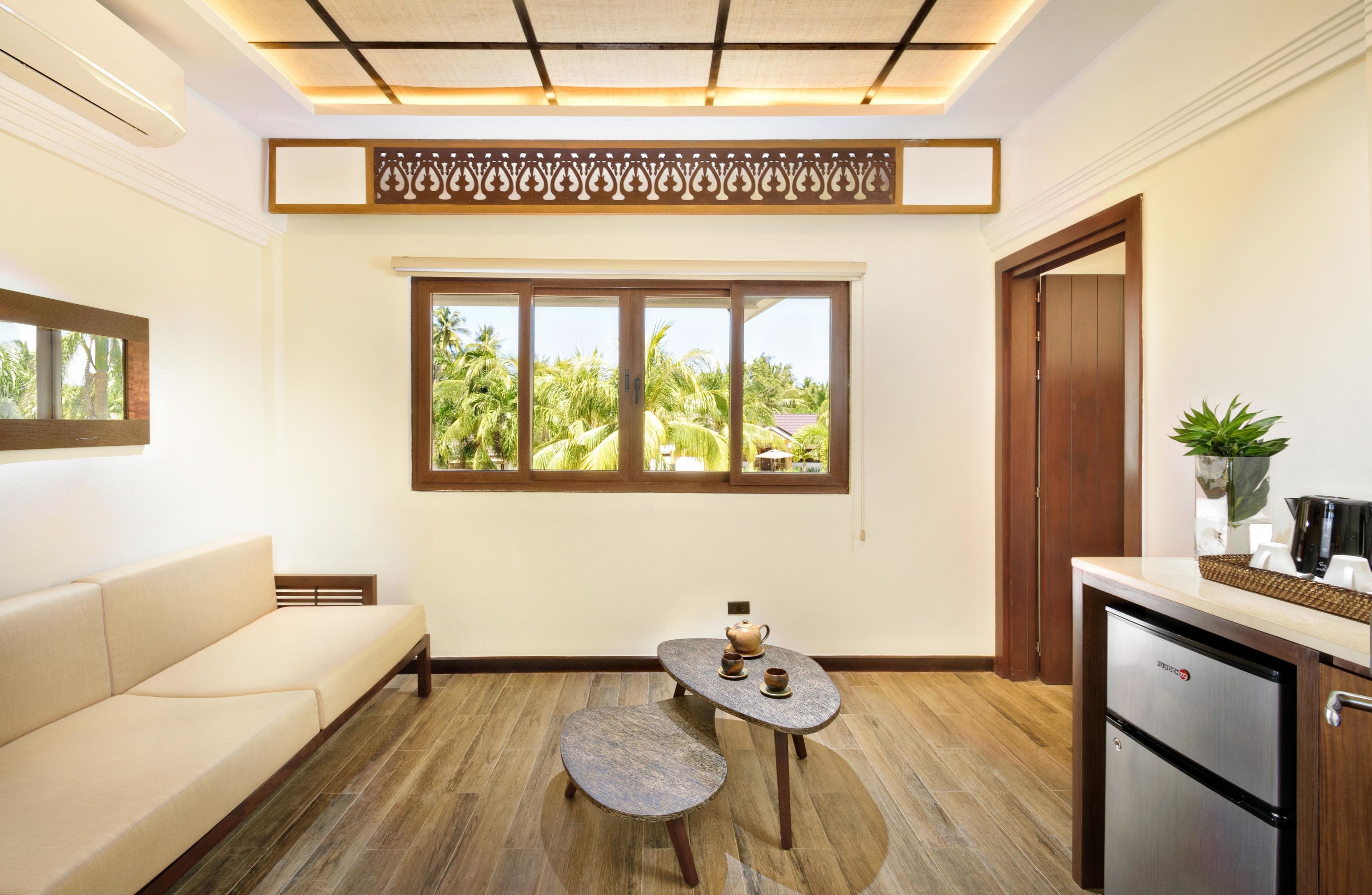 zen suite | living area | flat-screen tv