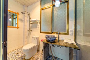Shower, free toiletries, hair dryer, slippers
