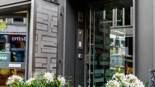 A storefront with a prominent 'Way' sign, a 'Goodge Street' address sign, and a glass door entrance. - Goodge Street IV (London)