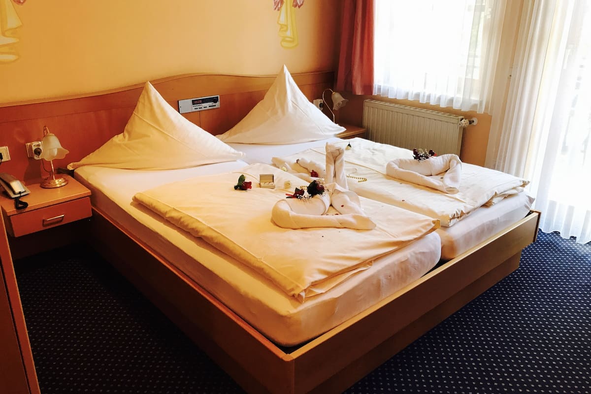 down duvets, blackout curtains, iron/ironing board, free wifi