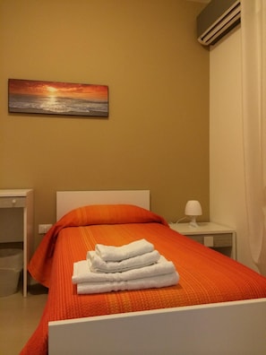 Caja de seguridad en la habitación, wifi gratis y ropa de cama 
