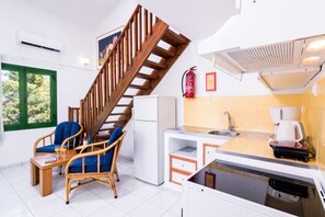 Duplex, 1 Bedroom, Mezzanine (Type C) | Living area | 32-inch flat-screen TV with satellite channels, TV - Helion Resort (Corfu)