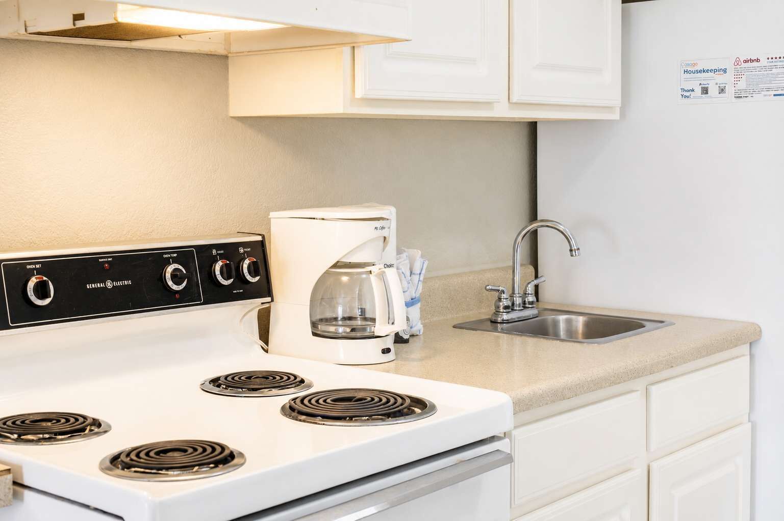 Coffee/tea maker, fridge, microwave, oven