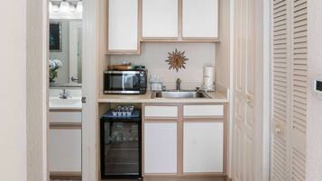 Microwave, coffee/tea maker, toaster, cookware/dishes/utensils