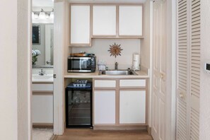 Microwave, coffee/tea maker, toaster, cookware/dishes/utensils